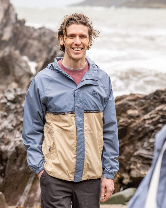 Rainer Tribal Mens Waterproof Packable Rain Jacket in Blue/Beige