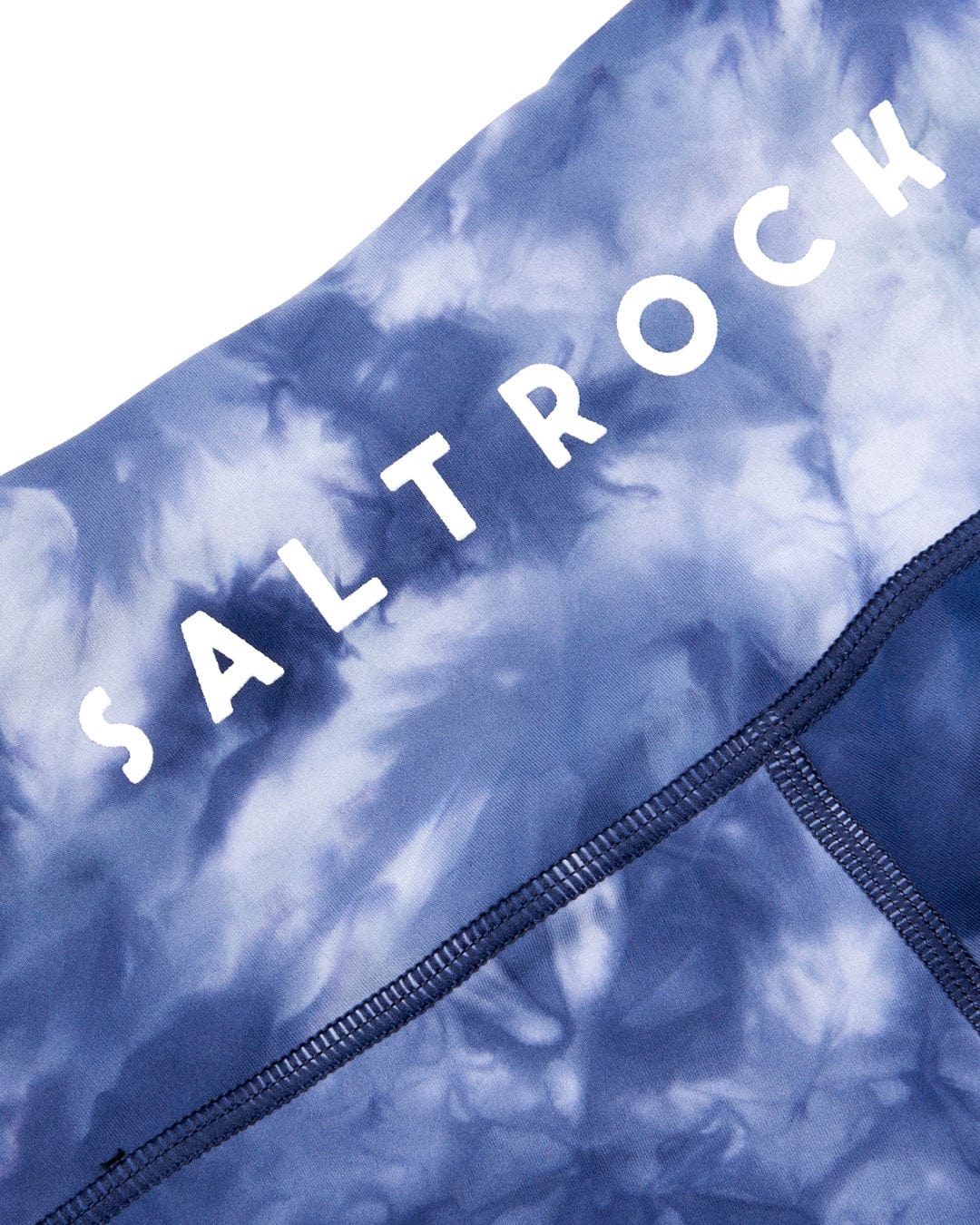 A high quality Ahimsa - Womens Legging - Blue with the word Saltrock on it.