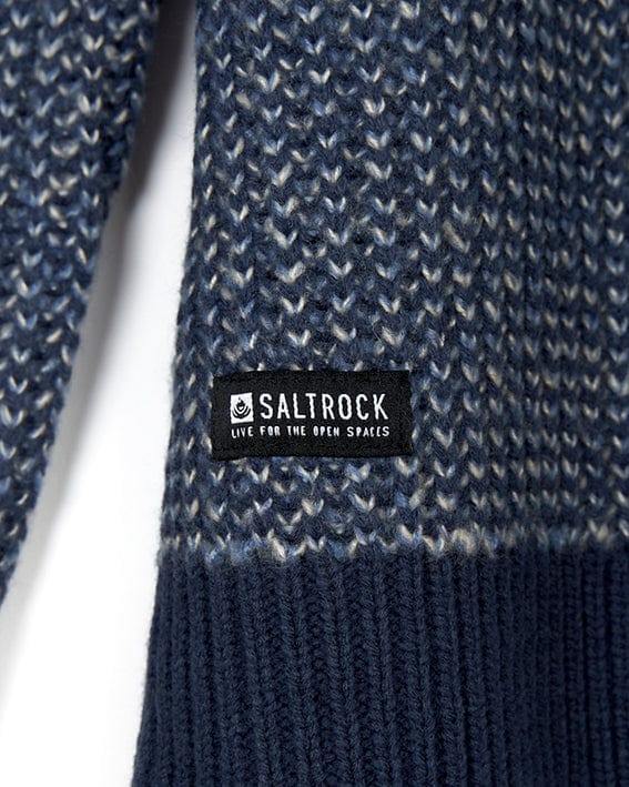 A close up of the Arlen - Mens Crew Knit - Blue sweater with the Saltrock branding.