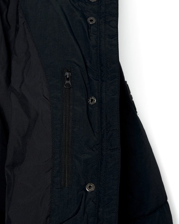An Aspen - Womens Short Puffer Jacket by Saltrock in black with padded material, zippers, and pockets.