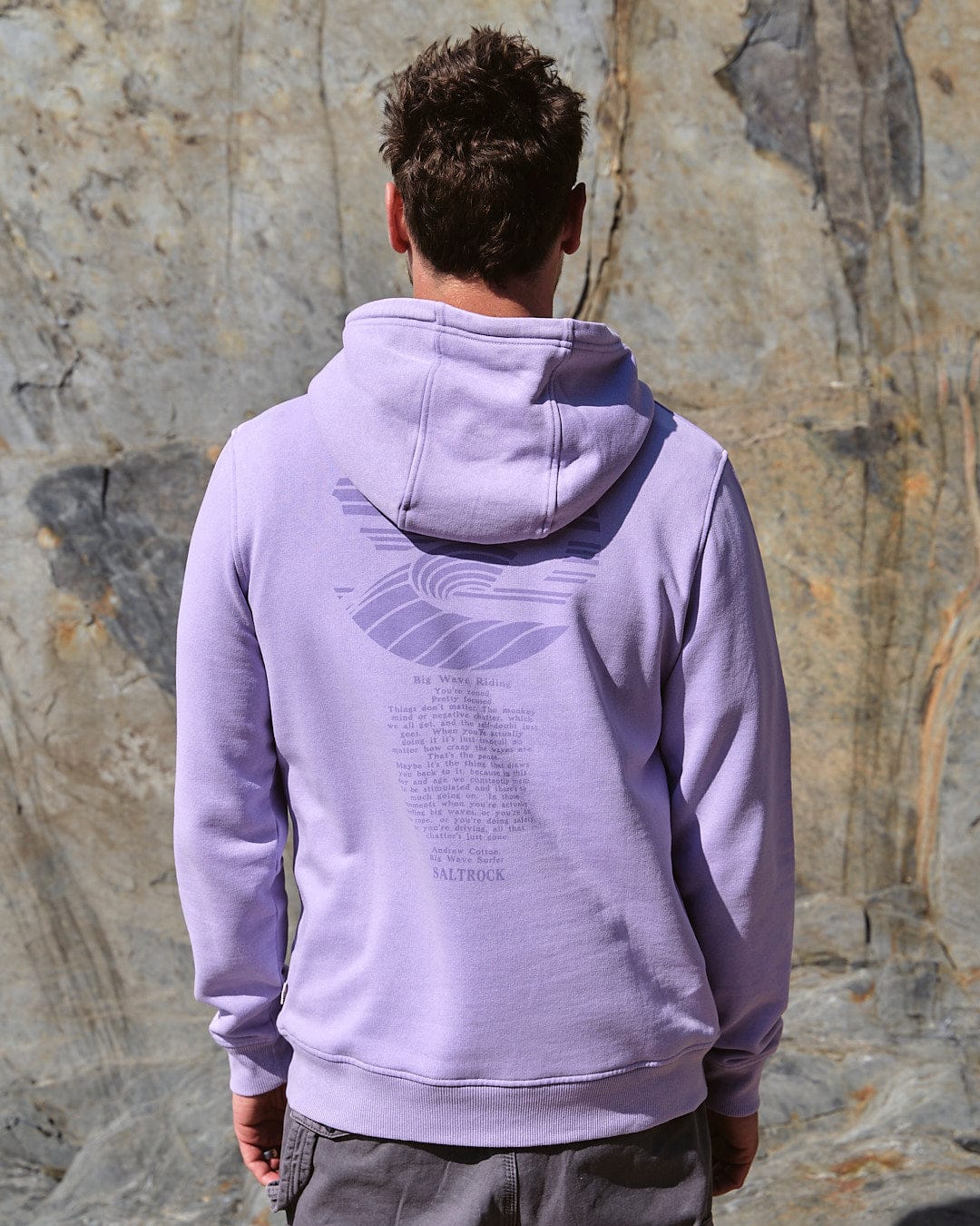 The back of a man wearing a Saltrock - Atlantic Mens Pop Hoodie - Purple.
