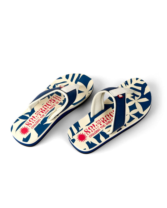 Saltrock Balance Women's Flip Flops in blue, featuring a bold floral design, ergonomic upper, and "Saltrock: Chasing the Salt" text on the footbeds.