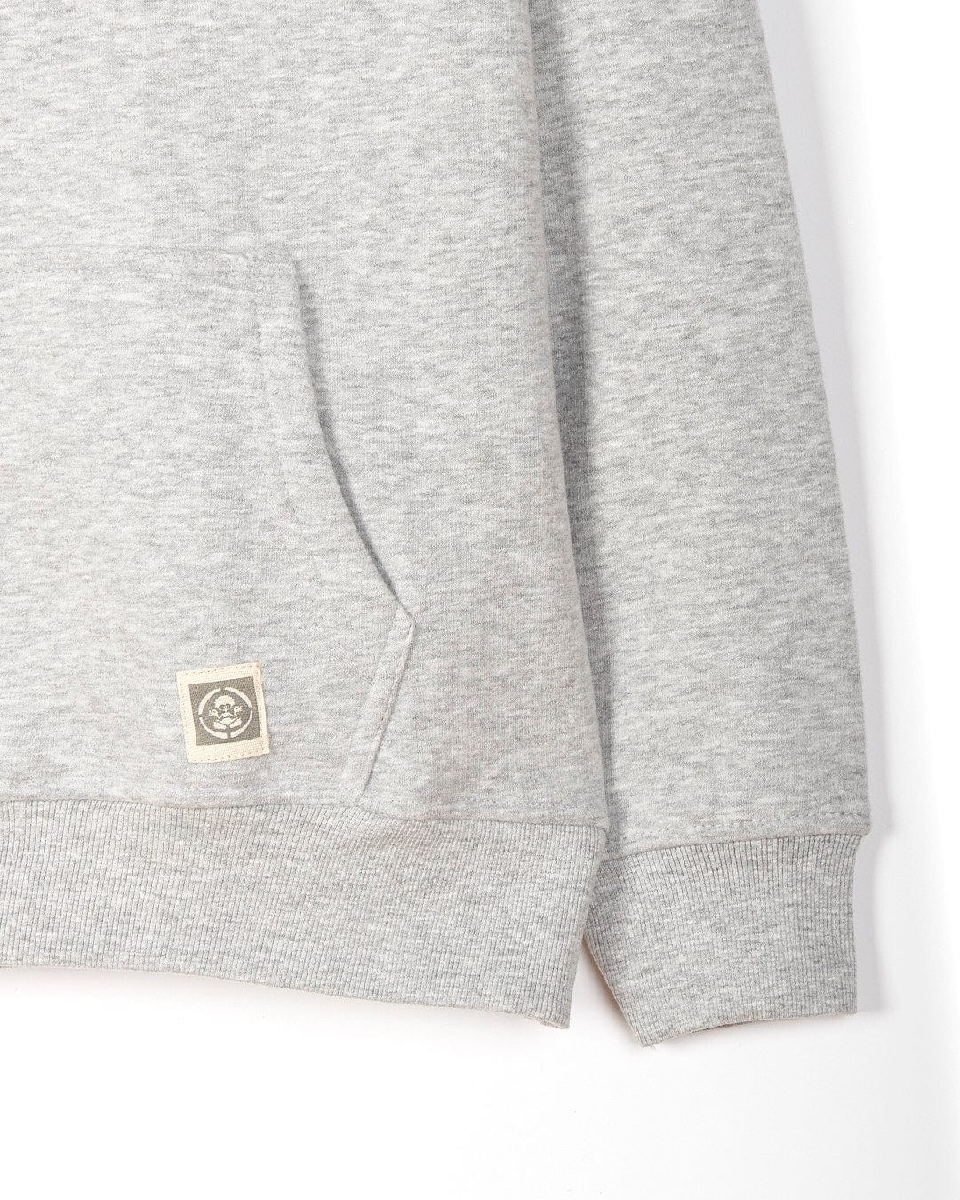 A close up of a Beach Signs Wales - Kids Pop Hoody - Grey sweatshirt with the Saltrock branding logo on it.