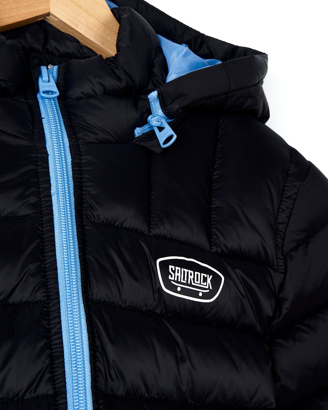 Stay warm and stylish with the Saltrock Beau - Kids Puffer Jacket - Black featuring a hood.
