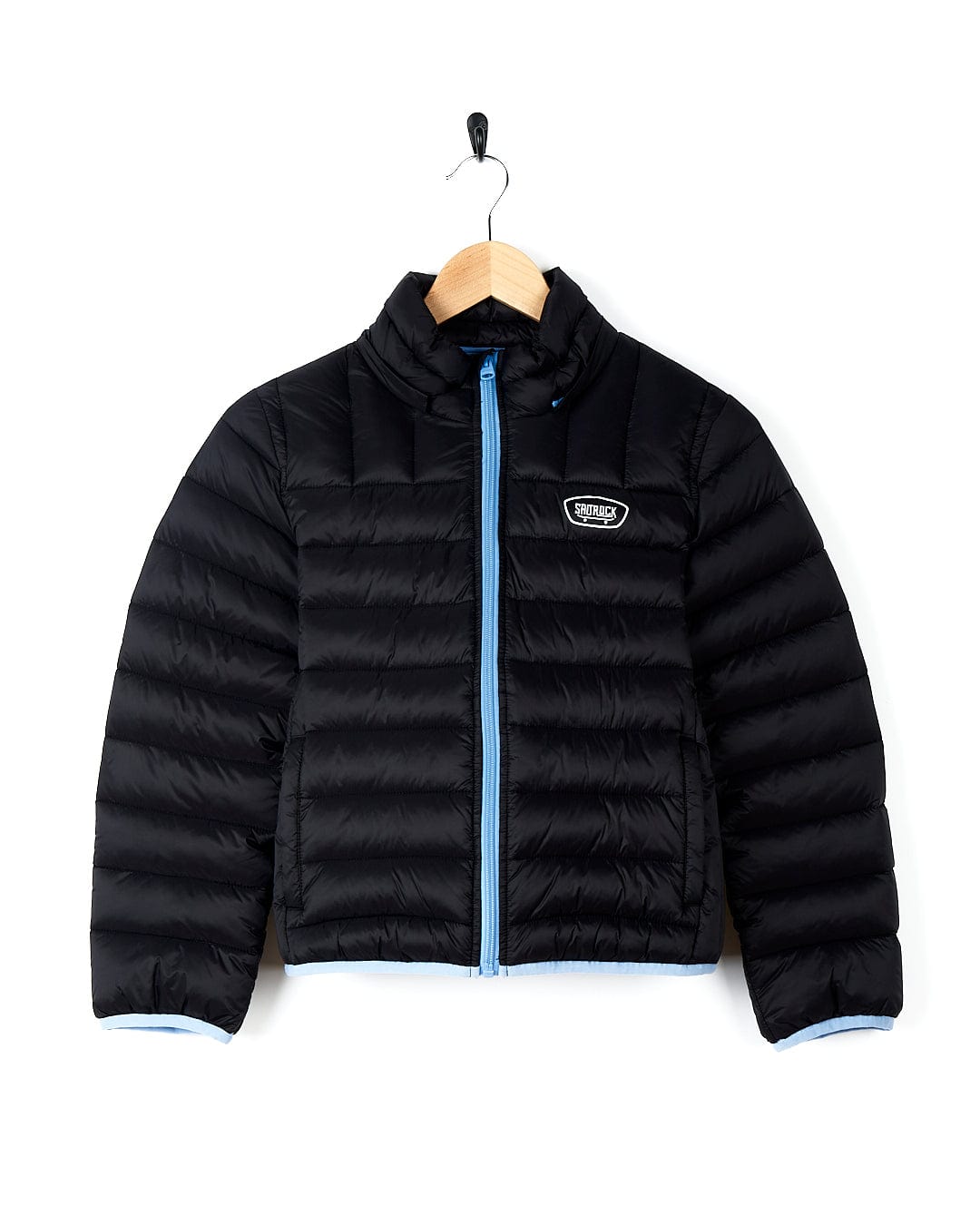 A Saltrock - Beau Kids Puffer Jacket - Dark Blue with a detachable hood hanging on a hanger.