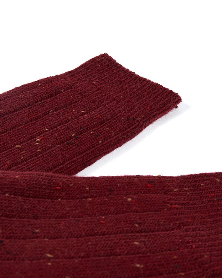 A pair of Cabin - Socks - Red by Saltrock on a white surface.