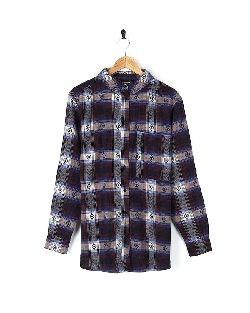 A Saltrock Camille - Womens Jaquard Check Boyfriend Shirt - Purple hanging in a wardrobe.