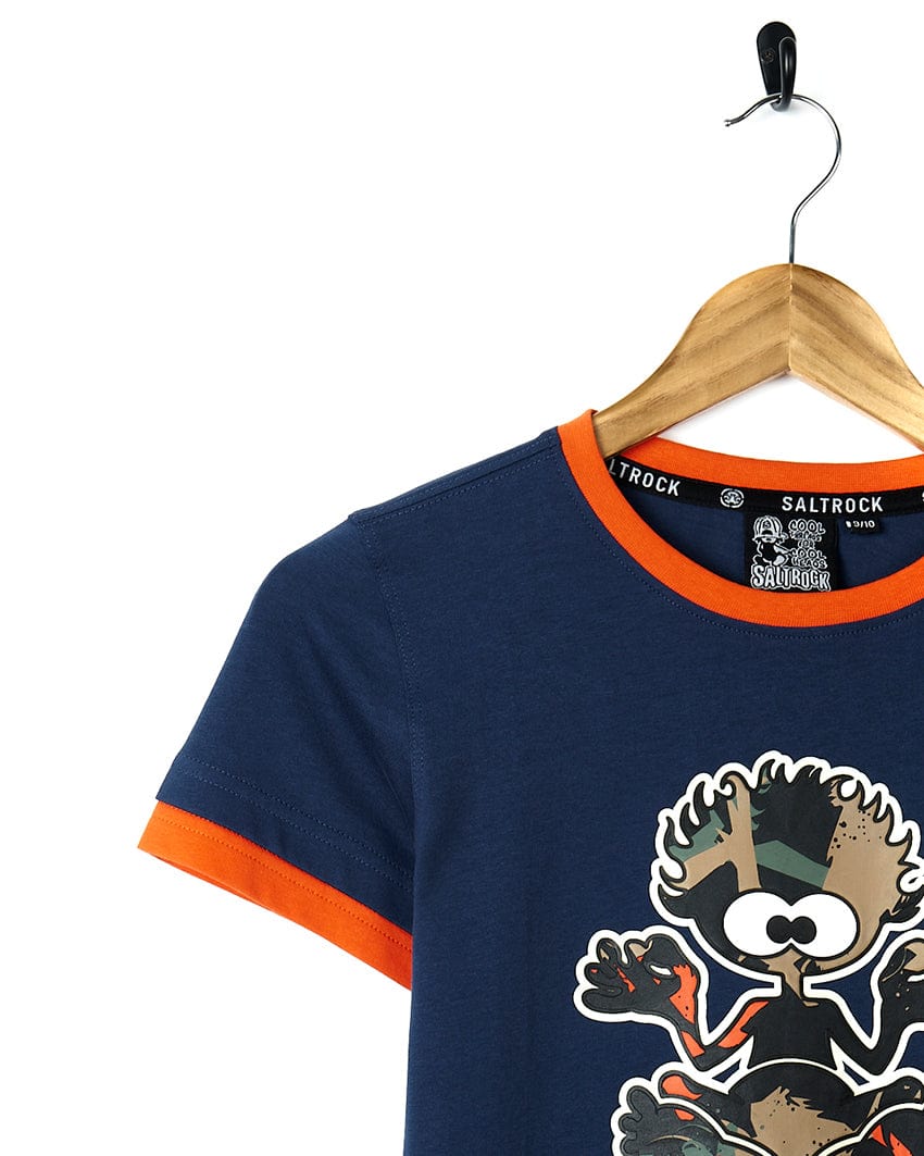 A Saltrock Camo Tok - Kids Glow in the Dark Short Sleeve T-Shirt - Dark Blue with a cartoon bear on it.