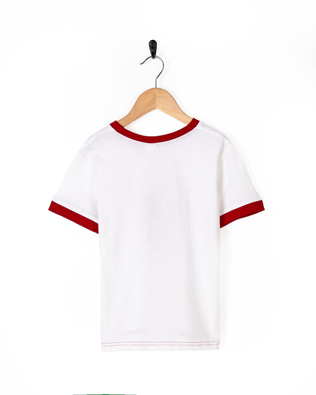 A Saltrock Chasing Waves Kids Short Sleeve T-Shirt hanging on a hanger.