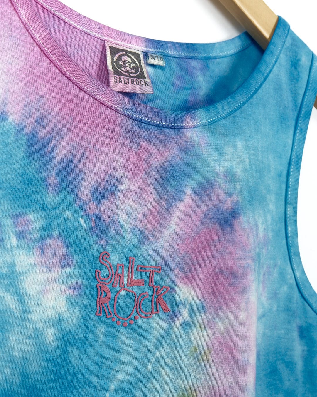 A Coralia - Kids Tie Dye Midi Dress - Pink with the brand name Saltrock on it.