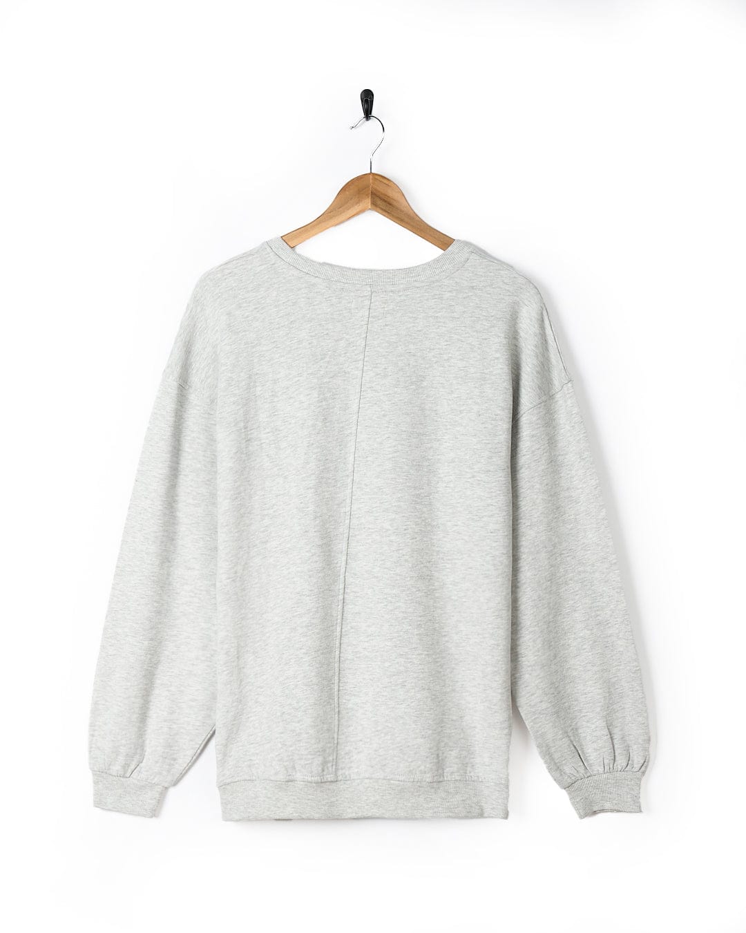 A Cosmic Soul - Womens Longline Sweat - Light Grey sweatshirt by Saltrock hanging on a hanger.