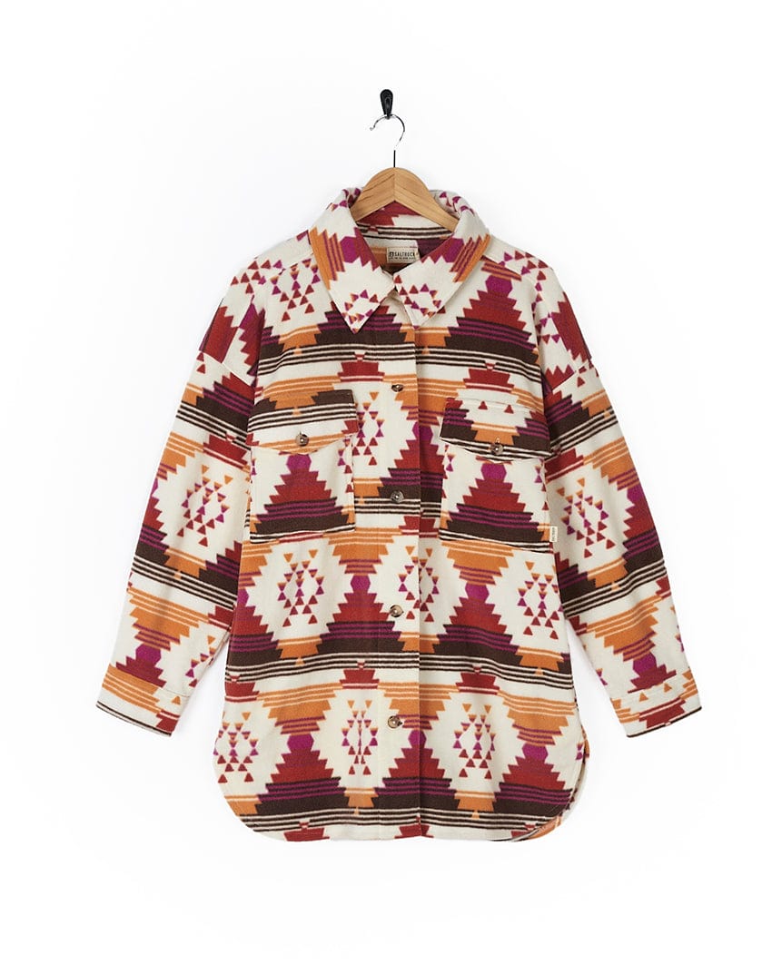 The Saltrock Dallyn Aztec Fleece Shacket is a women's winter cover-up featuring a mesmerizing Aztec print.