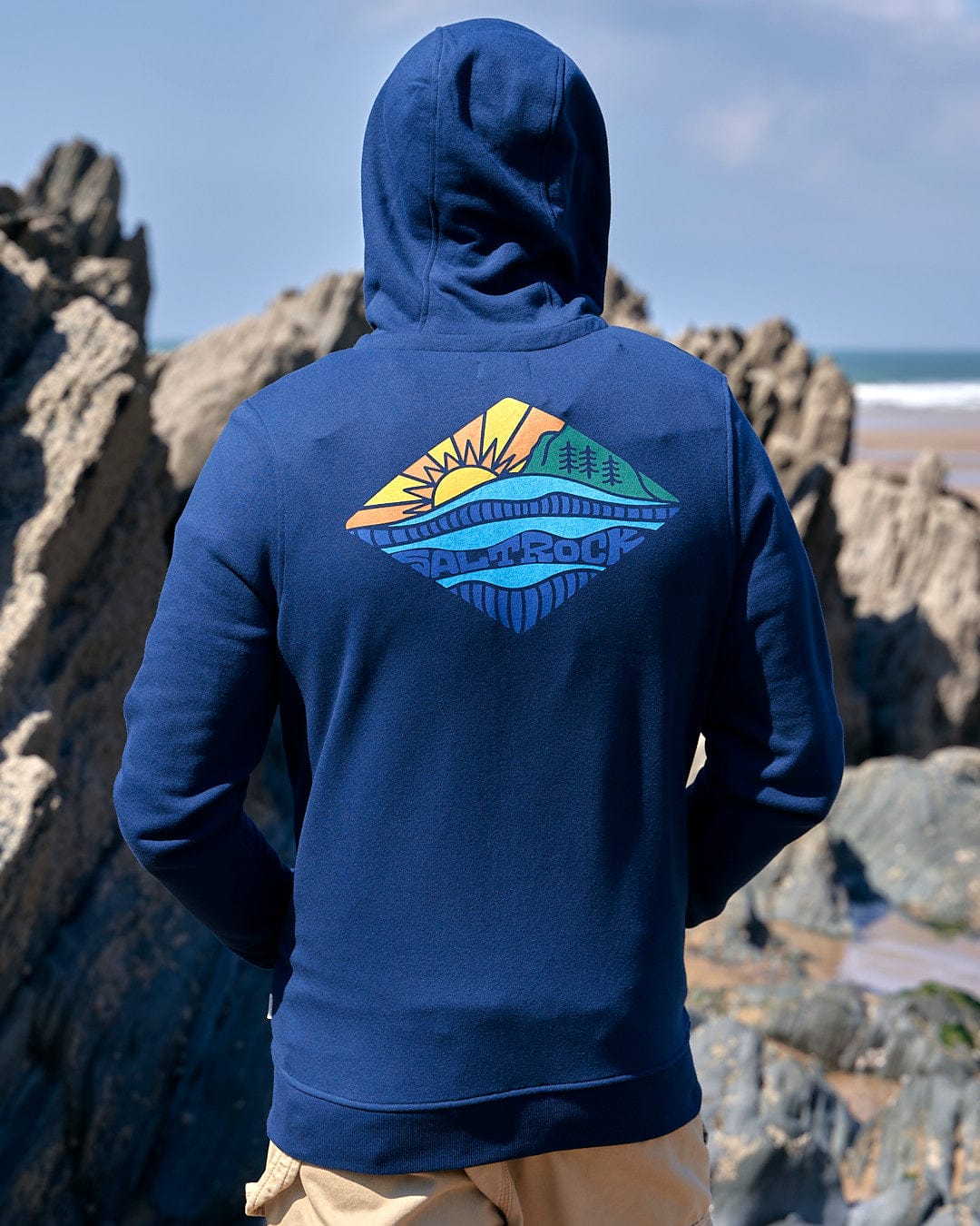 The back of a man wearing a Saltrock Diamond Scene - Mens Zip Hoodie - Blue.