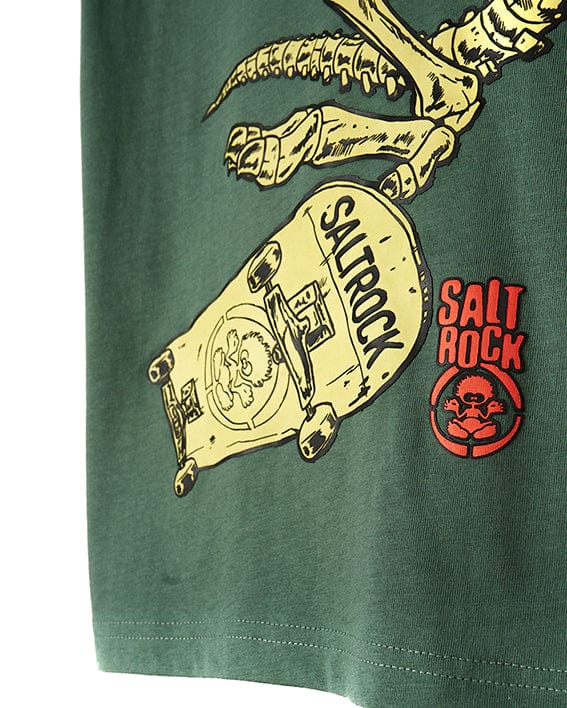 A cool and stylish Saltrock Dinosk8 - Kids Short Sleeve T-Shirt - Green featuring a dinosaur riding a skateboard.