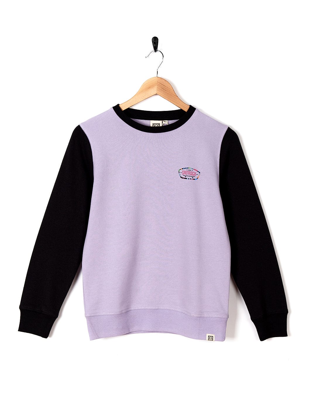 A Saltrock Elissa - Kids Crew Sweat - Light Purple sweatshirt with black sleeves.