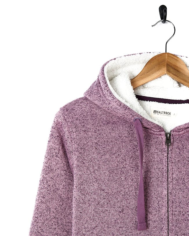 A women's Saltrock Farley - Lined Zip Hoodie - Purple hanging on a hanger.