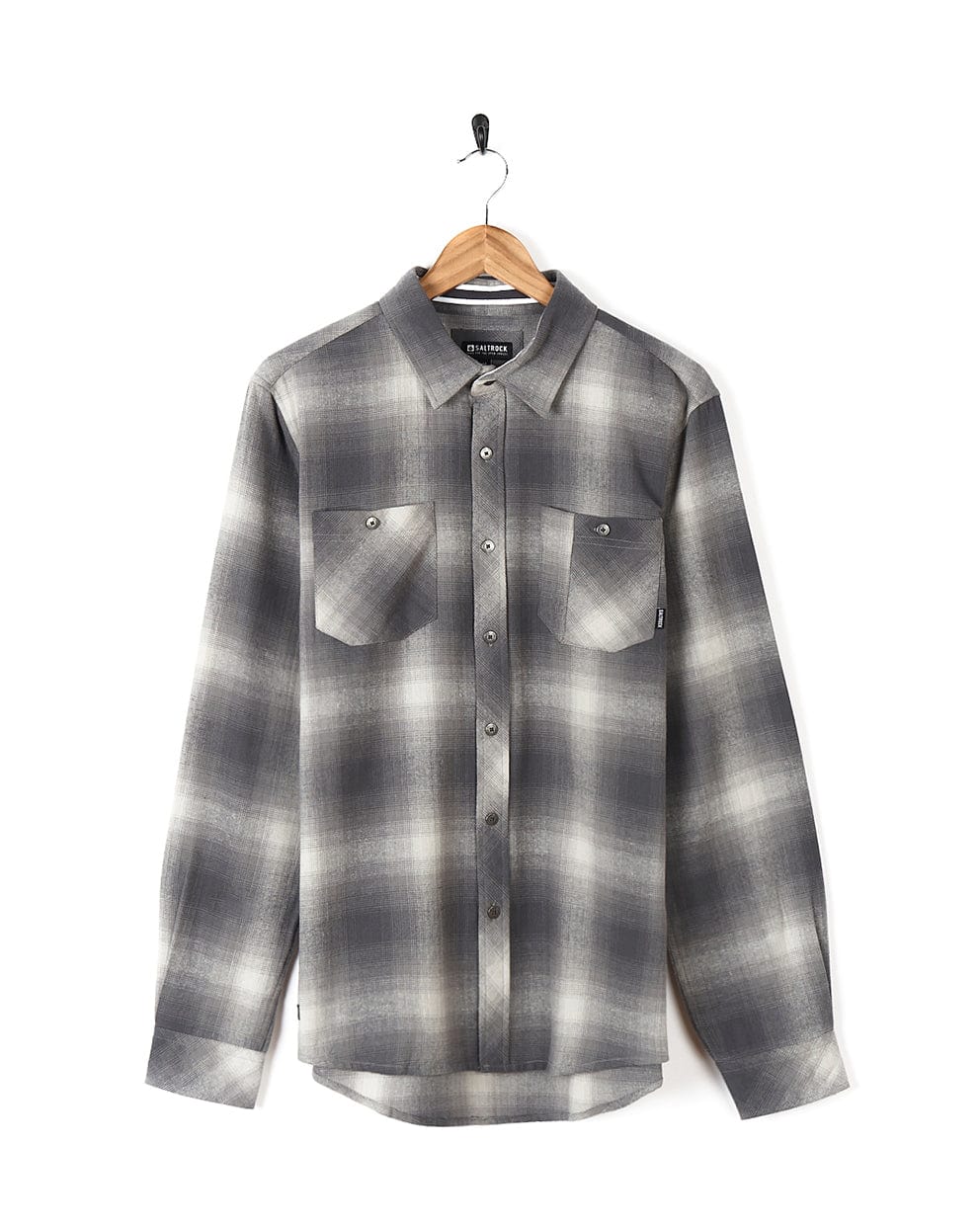 A Saltrock Farris - Mens Long Sleeve Check Shirt - Grey with buttoned cuffs hanging on a hanger.