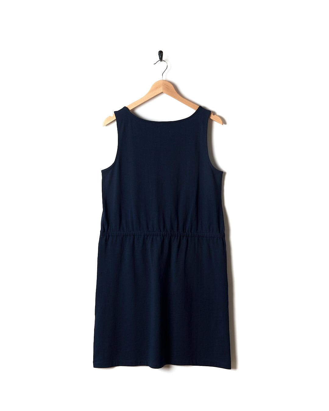 A Flax - Womens Tie Vest Dress - Blue by Saltrock hanging on a hanger.