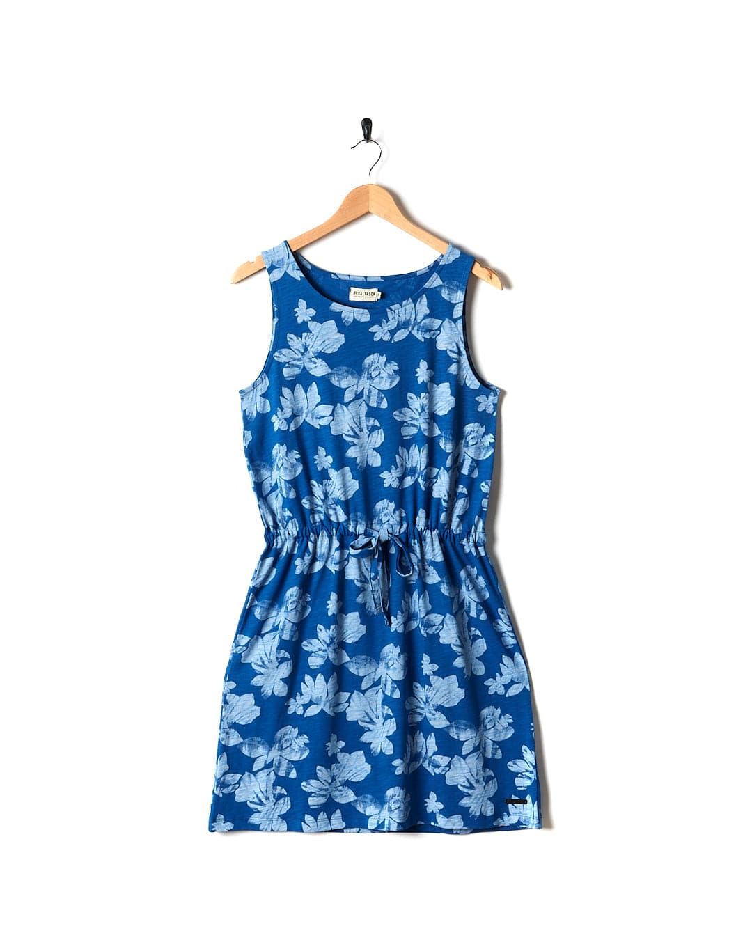 A Saltrock blue floral dress hanging on a hanger.