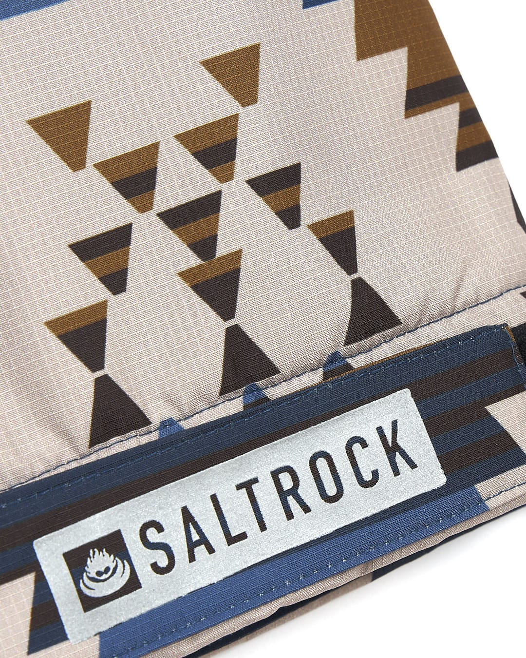 The Saltrock Four Seasons Changing Robe - Aztec has an aztec pattern on it.