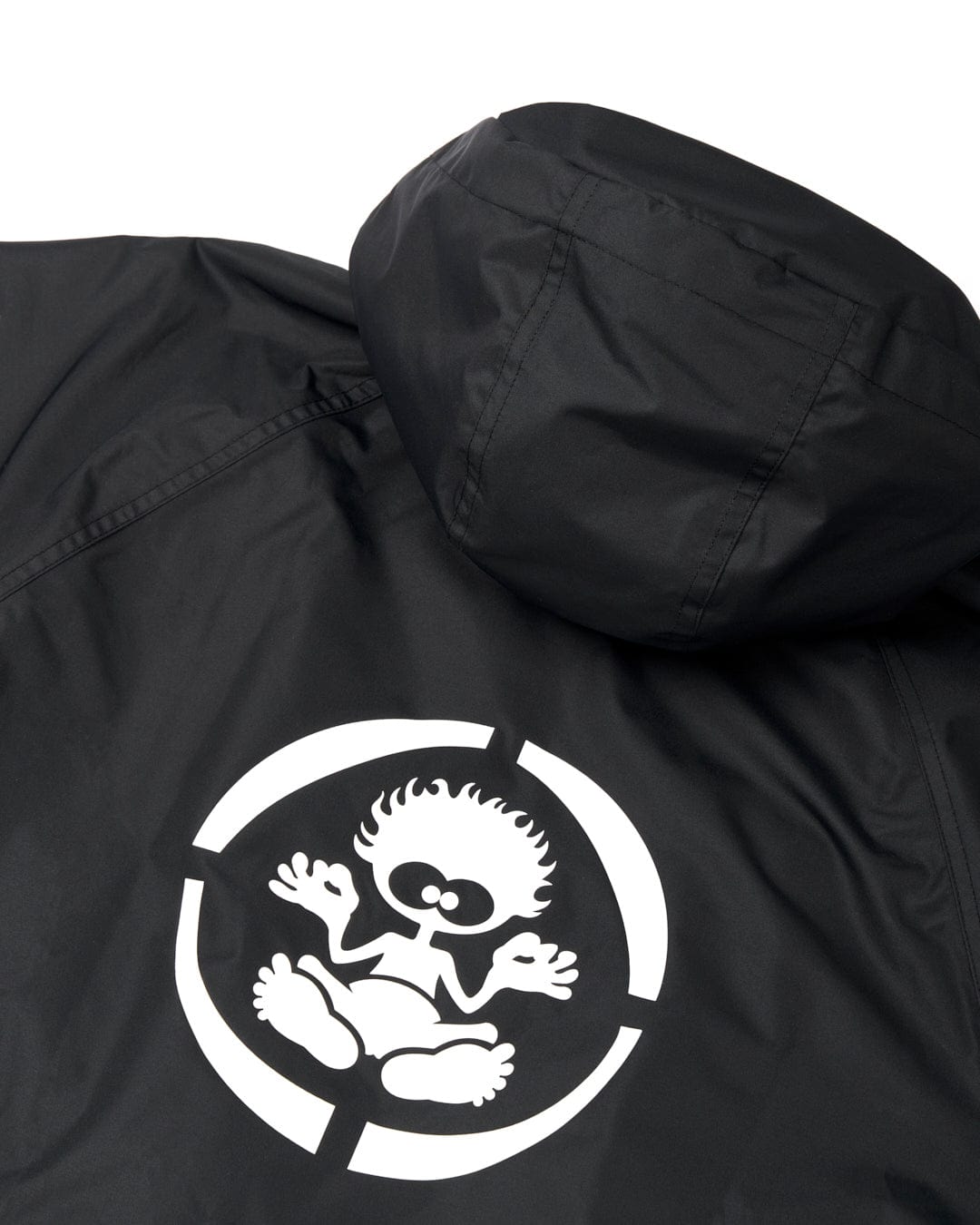 Black jacket made from 3K waterproof ripstop material, featuring a white circular logo with a cartoonish figure on the left chest area, like the Recycled Kids Four Seasons Changing Robe from Saltrock.