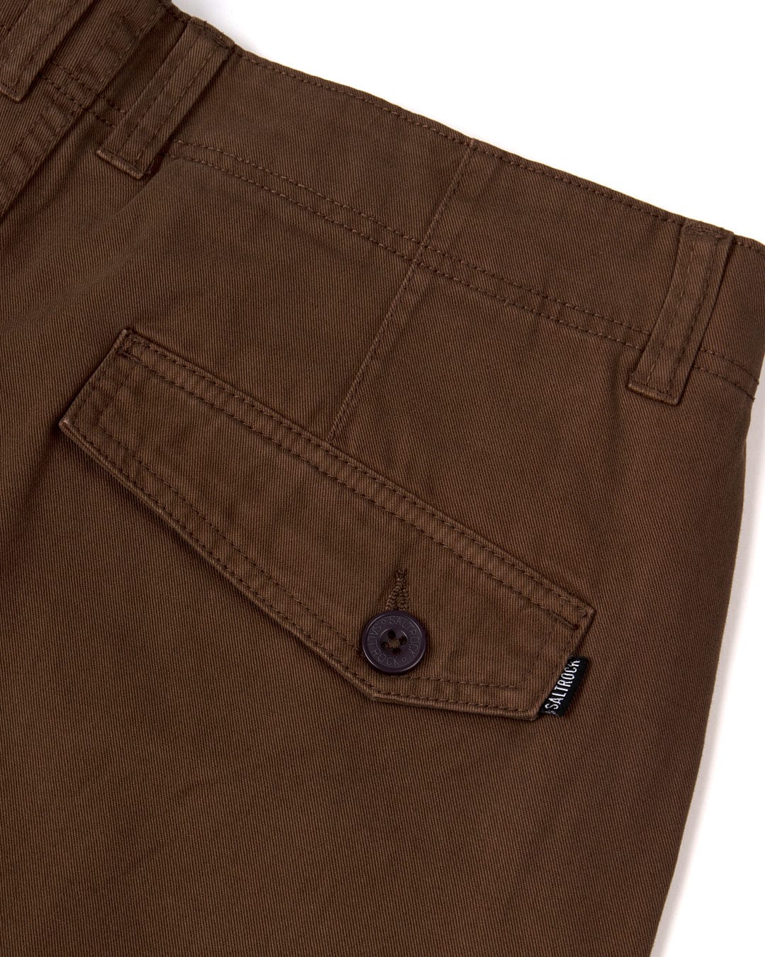 Close-up of a Godrevy 2 - Mens Cargo Trousers - Brown pocket with a button and Saltrock branding.
