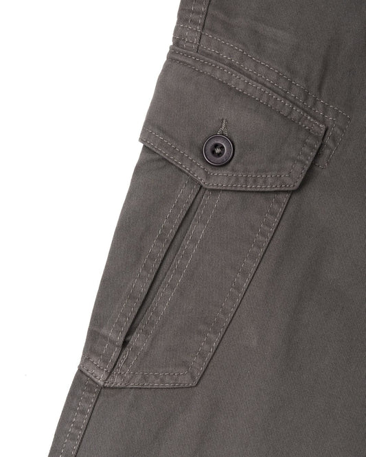 Close-up of Saltrock's Godrevy 2 - Mens Cargo Trousers in Dark Grey fabric sleeve with a buttoned strap and cargo patch pockets.