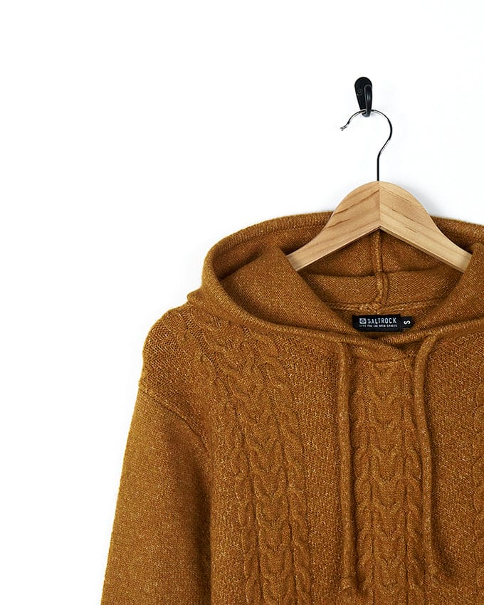 A Saltrock Hele Bay 2 - Womens Knitted Jumper - Yellow sweater hanging on a hanger.