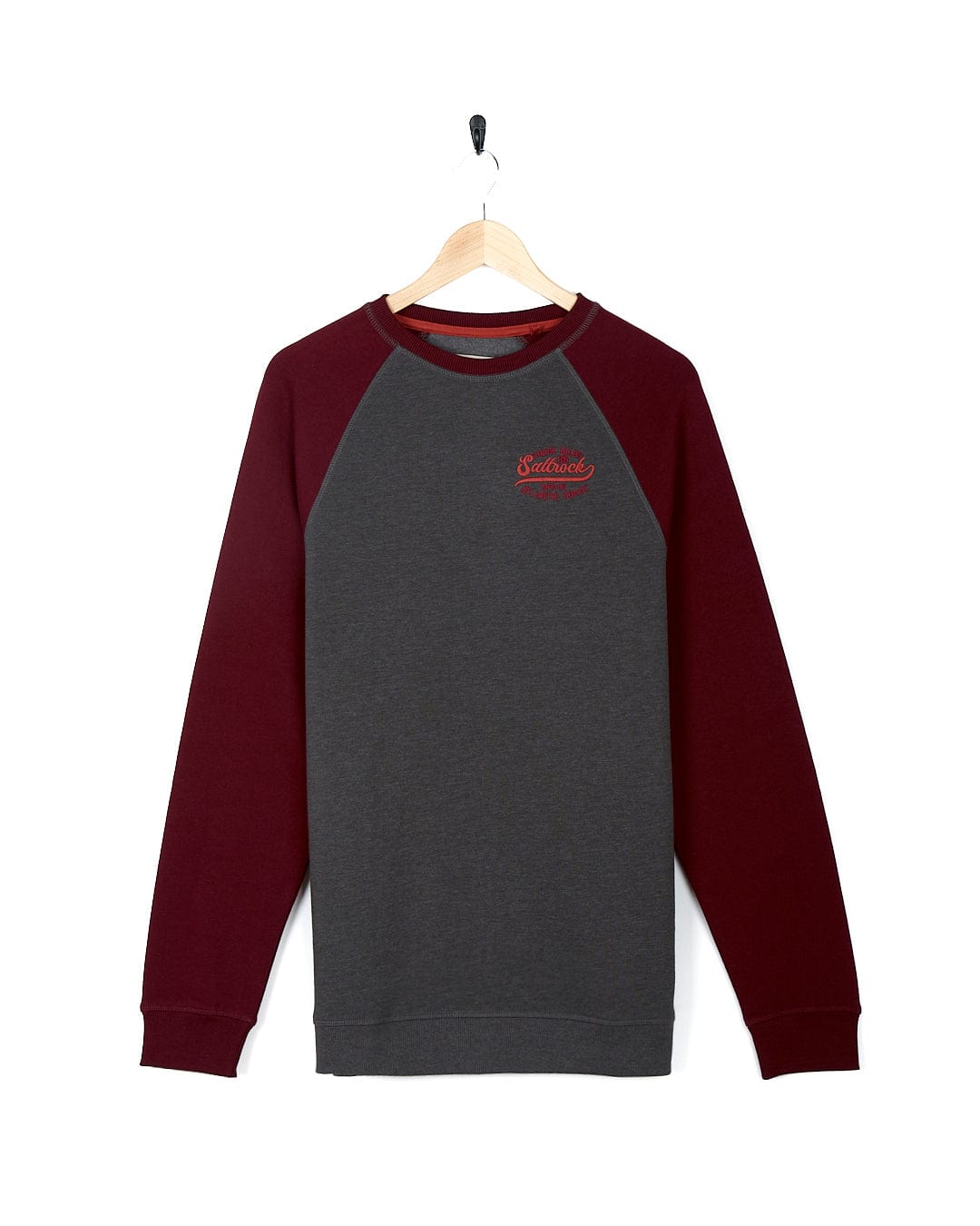 A Saltrock Home Run - Mens Long Sleeve Sweat - Grey/Red with contrasting red sleeves displayed on a hanger.