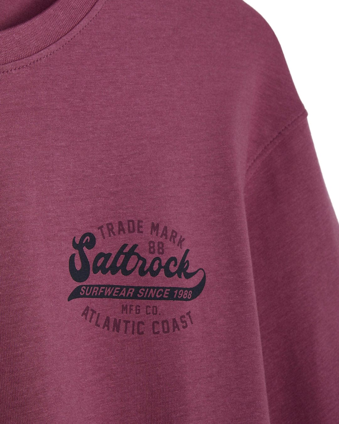 A Saltrock Home Run - Mens Short Sleeve T-Shirt - Dark Pink with a maroon color and the phrase "saltrock atlantic coast".