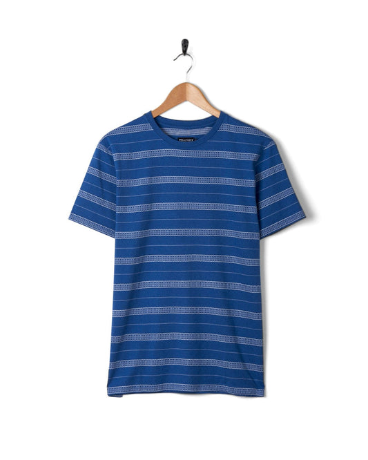 A Jacques Mens Short Sleeve T-Shirt in Blue made of cotton hanging on a hanger.