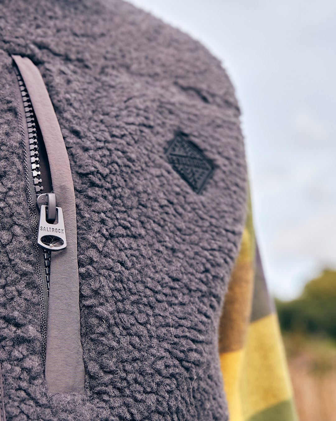A close up of a Saltrock Joel - Mens Sherpa Fleece Gilet - Dark Grey vest.