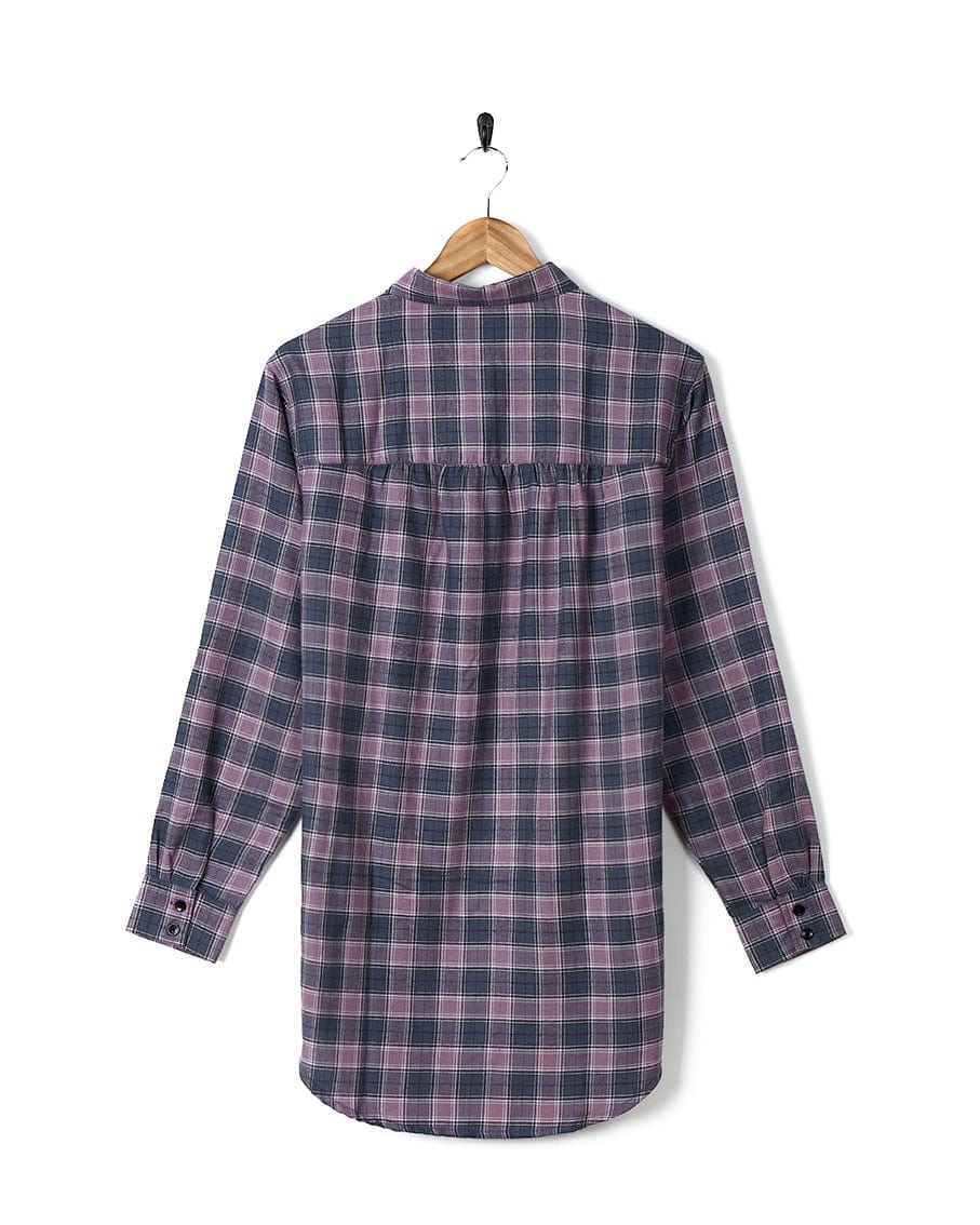 A Saltrock Kizzie - Womens Check Boyfriend Shirt - Purple hanging on a hanger.