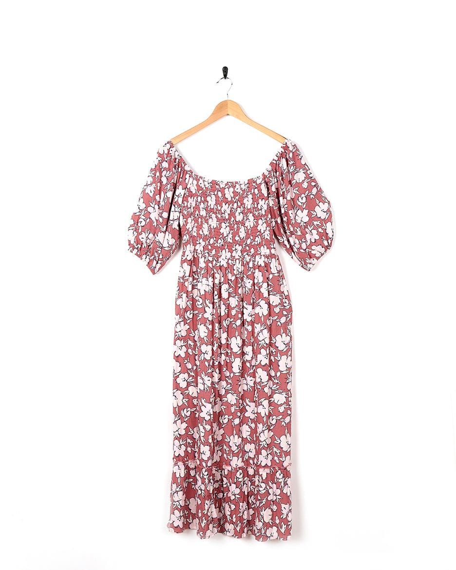 A Saltrock Larran - Womens Shirred Dress - Mid Pink hanging on a hanger.