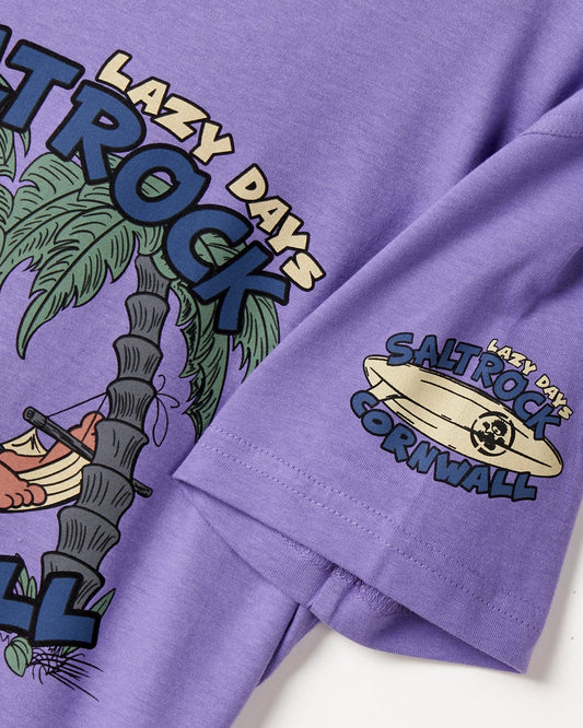 A Lazy Location Cornwall - Kids T-Shirt - Purple with a picture of a boat, perfect for Cornwall surfing enthusiasts by Saltrock.