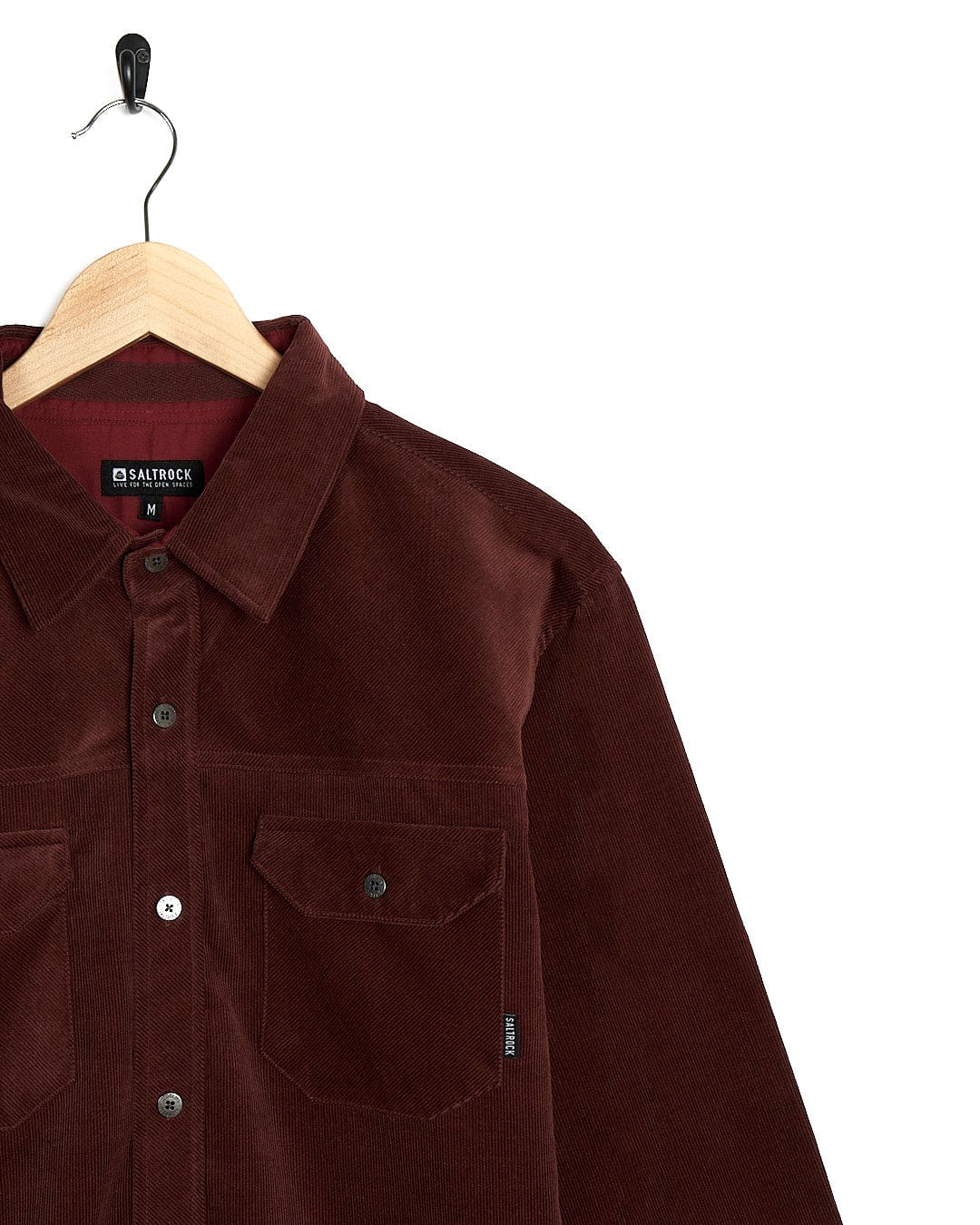 A Saltrock Linus - Mens Long Sleeve Shirt - Dark Red hanging on a hanger.