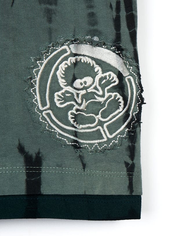 A Saltrock Live And Let - Kids Tie Dye Short Sleeve T-Shirt - Green with a teddy bear on it.