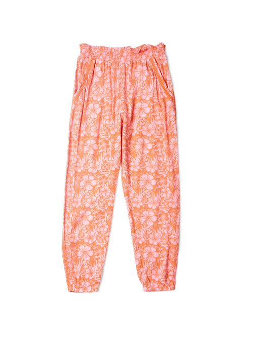 A pair of Lottie Hibiscus - Kids Trousers - Orange/Pink by Saltrock, with elasticated waist, isolated on a white background.