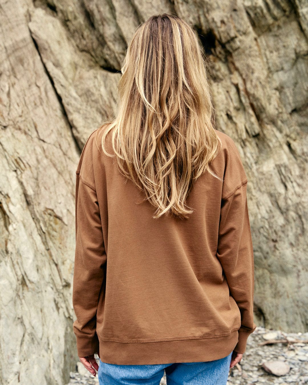 Louisa wearing a Saltrock Womens Crew Sweat - Brown made of cotton.