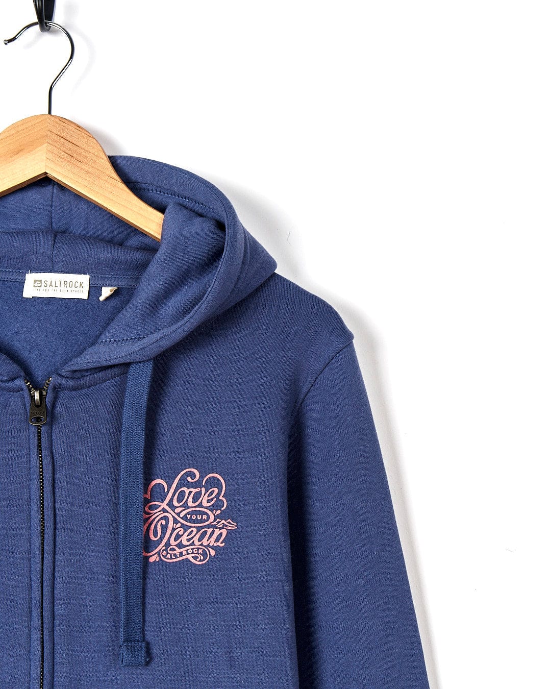A Love Your Ocean - Womens Zip Hood - Dark Blue hoodie with a pink logo on it by Saltrock.