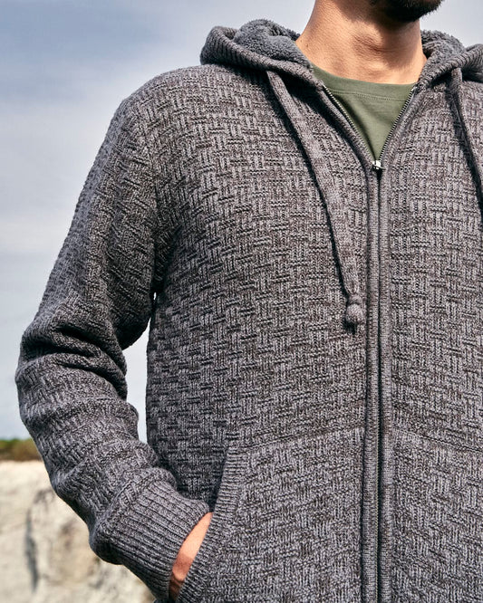 A man wearing a Saltrock branded Markus - Mens Borg Lined Knit Hoodie - Grey zip up hoodie.