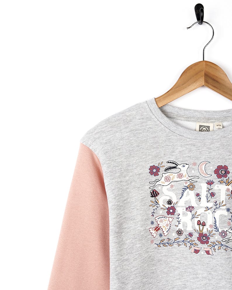 A Meadow - Kids Sweatdress - Grey with pink flowers on it, combining comfort and style by Saltrock.