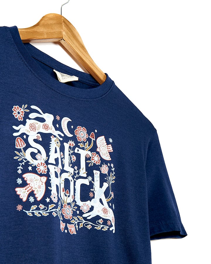 The Meadow - Kids T-Shirt - Dark Blue showcases a trendy design featuring the Saltrock branding and the words "salt rock" printed on it.