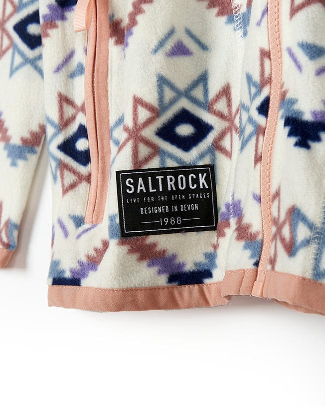 A white and pink Saltrock Micro Ida - Womens Zip Fleece - Cream with the word "Saltrock" branding on it.