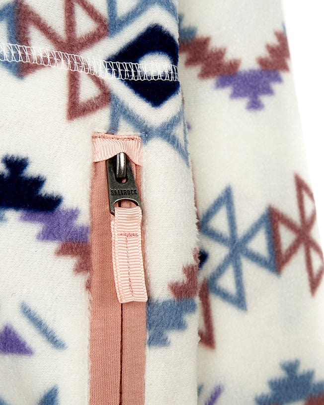 A close up of a warm and cozy Saltrock Micro Ida - Kids Zip Fleece - Cream.