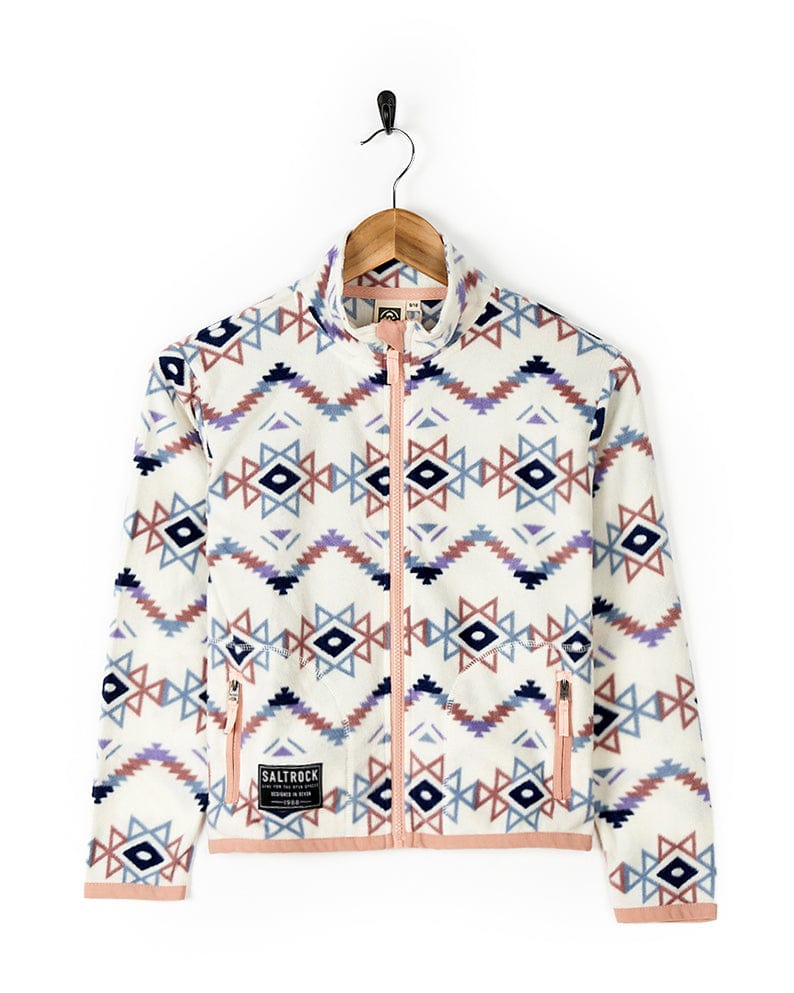 A warm Micro Ida - Kids Zip Fleece - Cream jacket with an Aztec print for added comfort, by Saltrock.