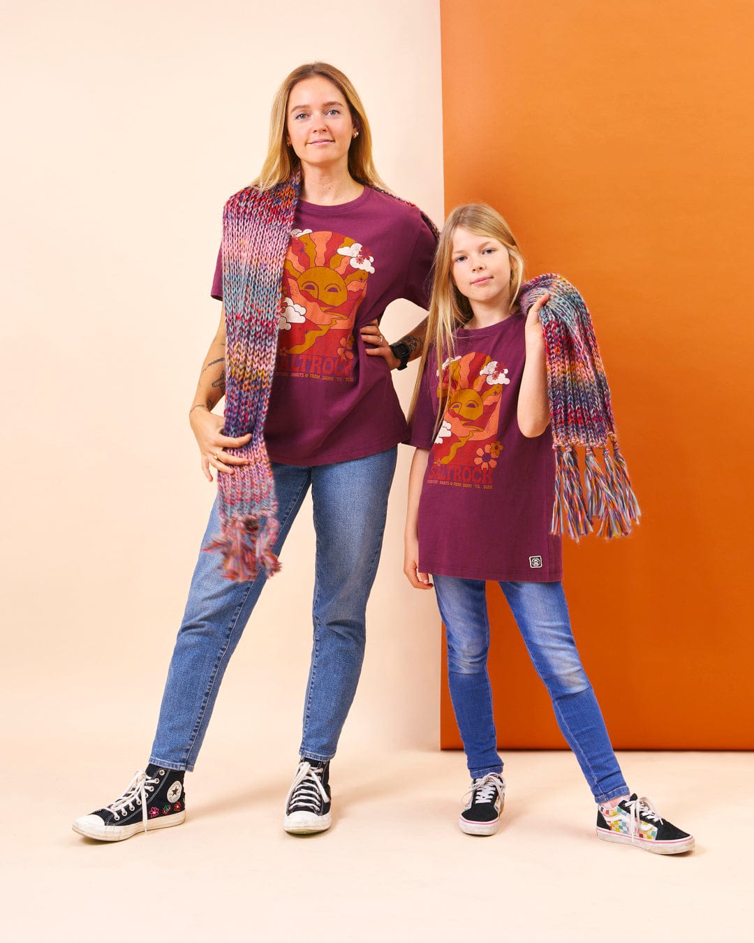 A mother and daughter posing for a photo in a Saltrock Adventure Awaits - Kids Short Sleeve T-Shirt - Dark Purple, ready for outdoor adventures.