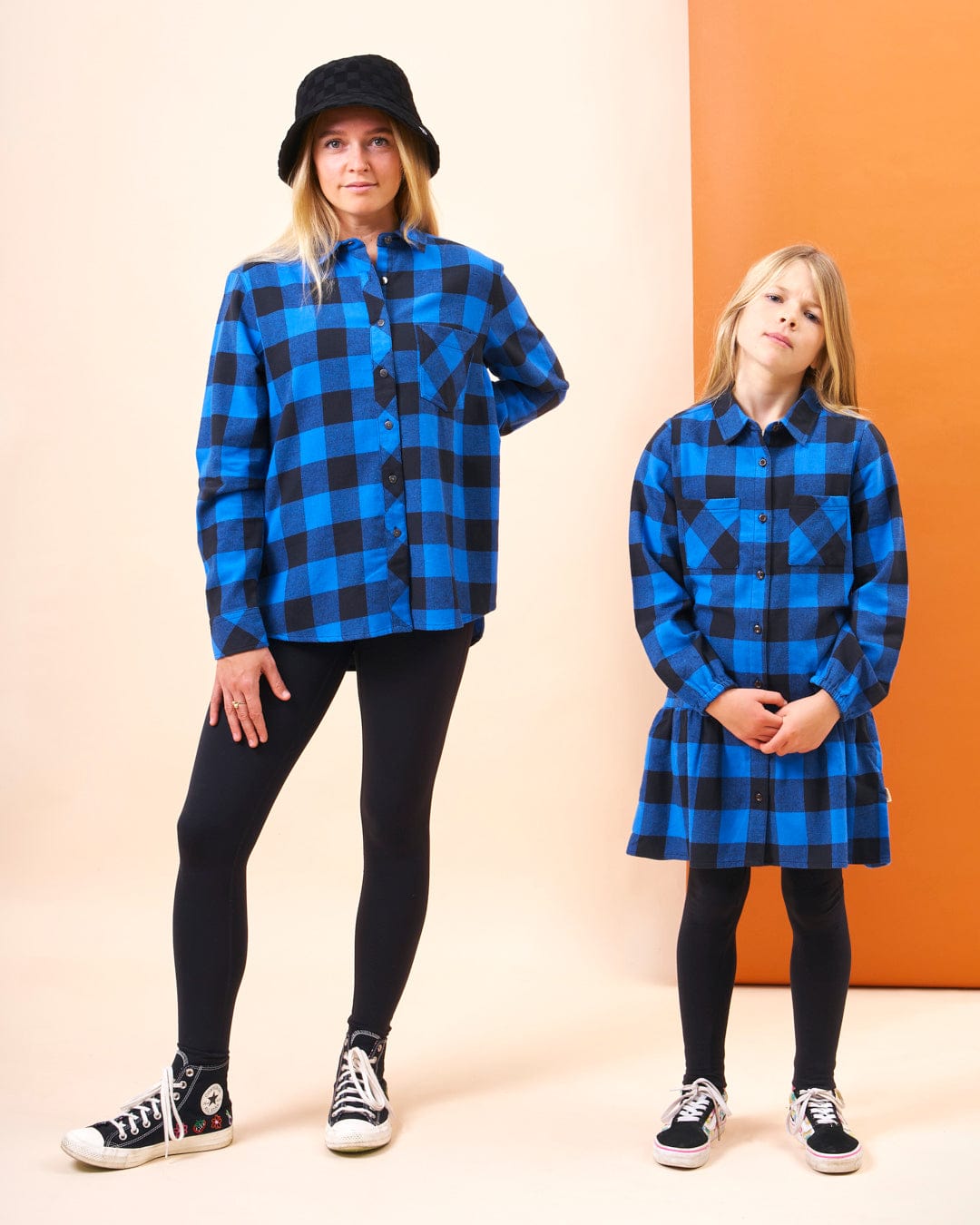 Two women wearing Saltrock's Rosalin - Womens Check Shirt in Blue/Black made of cotton.