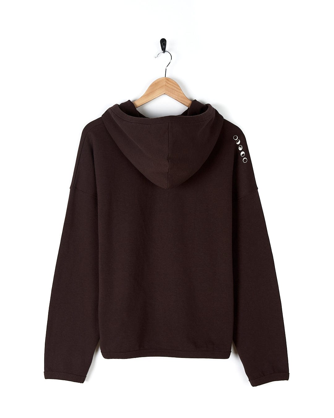 A cozy Saltrock Mocha - Womens Pop Hoodie - Brown hanging on a hanger.