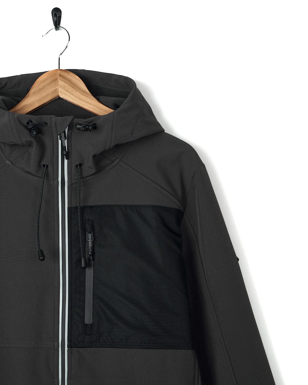 A grey Saltrock jacket, made with water-resistant fabric, is hanging on a hanger.